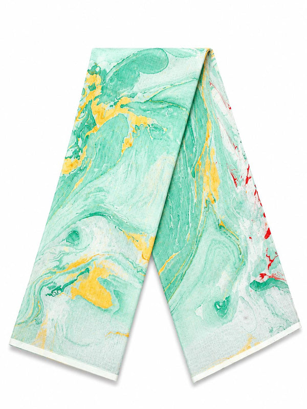 a light green border and a vibrant green, yellow, and red marble swirl pattern saree.