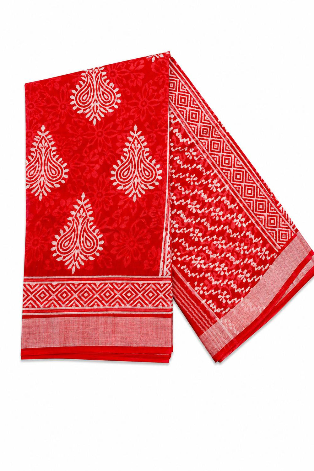 A woman models a bright red saree with white bandhani tie-dye patterns.